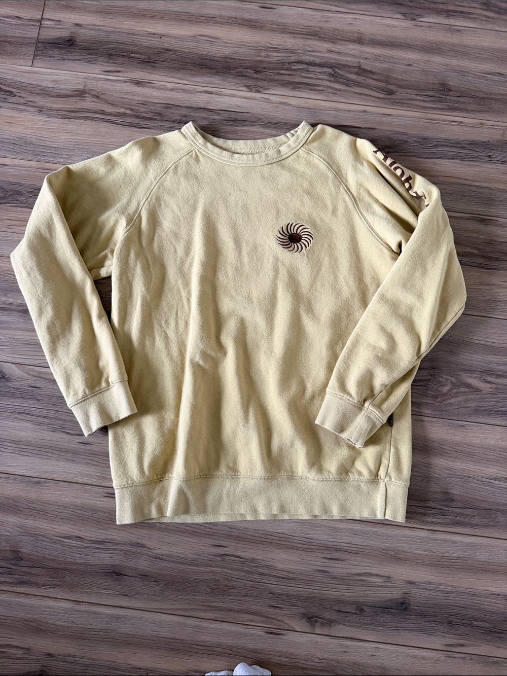 Yellow Crewneck Sweater with Spiral Chest Emblem